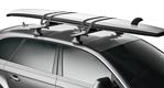 Thule SUP and Surfboard shuttle loaded on car