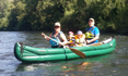 Paddling the Gumotex Scout inflatable canoe along a river