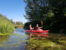 Gumotex Twist 2 with two adults paddling in Sussex on a local river