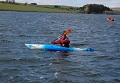 Staff member Simon paddling the Expression 11